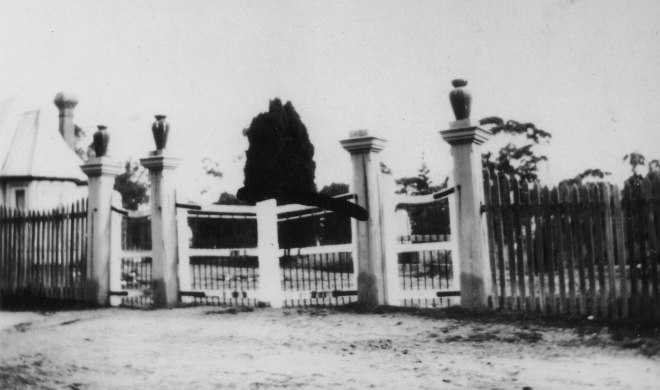 Amherst Cemetery gates, with the fence that Andy repaired in 1927. The Sexton's cottage on the left. Reproduced courtesy of the Talbot Arts & Historical Museum Inc.